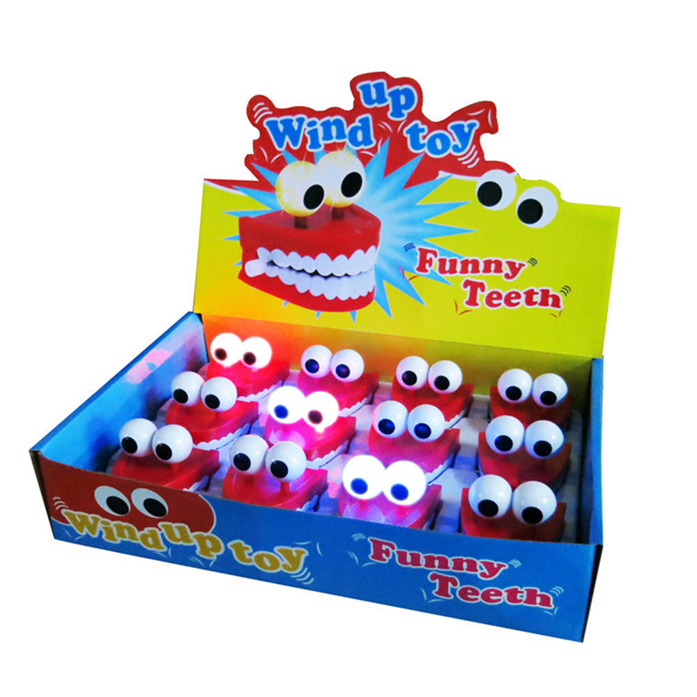 1 stuks clockwork jumping teeth red wind up grappige mondtand met ogen knipperende nieuwigheden trick toys